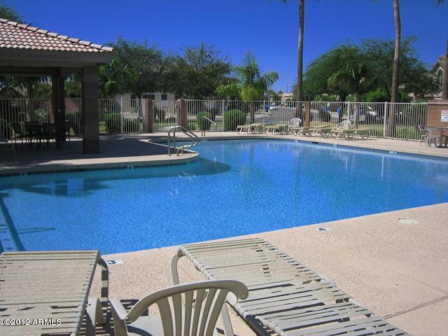 4533 E Glenhaven Dr, Phoenix, AZ 85048 - community pool featuring a patio area