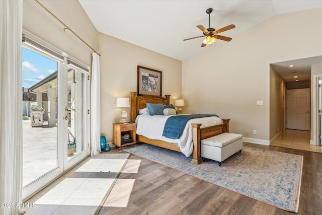 14401 N Coral Gables Dr, Phoenix, AZ 85023 - bedroom featuring high vaulted ceiling, baseboards, wood finished floors, and access to exterior