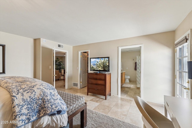 14401 N Coral Gables Dr, Phoenix, AZ 85023 - bedroom with visible vents, connected bathroom, and light tile patterned floors