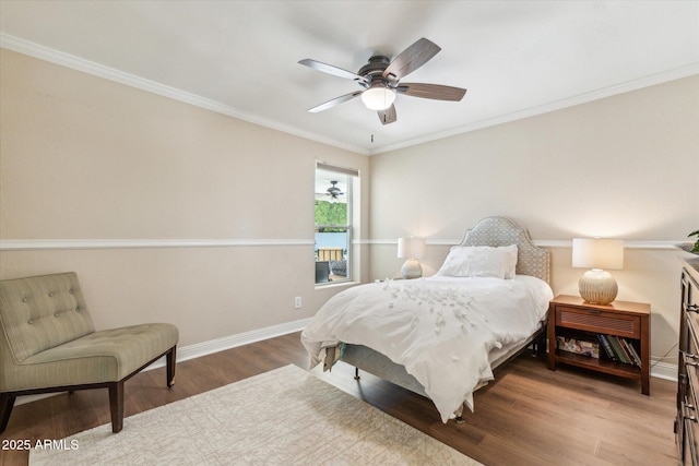 14401 N Coral Gables Dr, Phoenix, AZ 85023 - bedroom featuring crown molding, baseboards, a ceiling fan, and wood finished floors