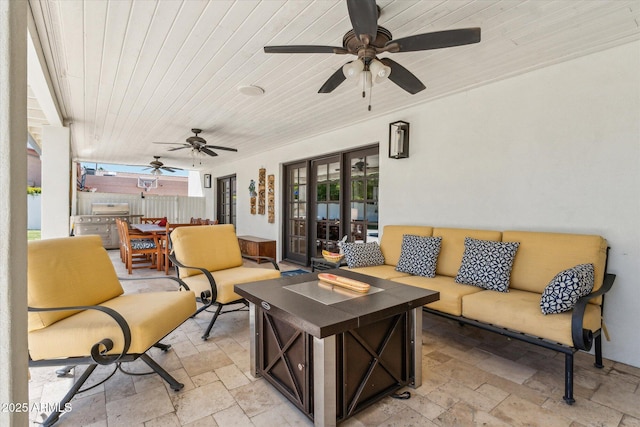 14401 N Coral Gables Dr, Phoenix, AZ 85023 - view of patio / terrace with fence, outdoor dining space, exterior kitchen, an outdoor living space with a fire pit, and a ceiling fan