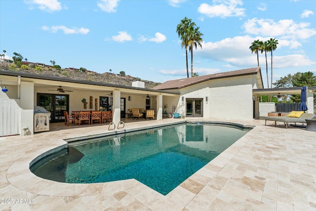 14401 N Coral Gables Dr, Phoenix, AZ 85023 - outdoor pool with french doors, outdoor lounge area, a ceiling fan, and a patio area