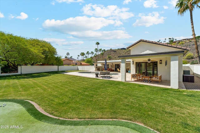 14401 N Coral Gables Dr, Phoenix, AZ 85023 - back of property with a patio, a fenced backyard, ceiling fan, and stucco siding