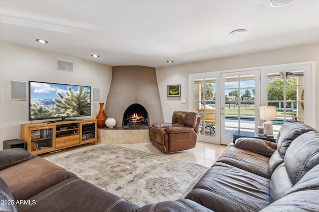 14401 N Coral Gables Dr, Phoenix, AZ 85023 - living room featuring recessed lighting, visible vents, a wealth of natural light, and a fireplace