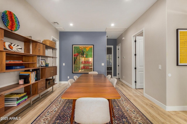 dining room with light hardwood / wood-style floors