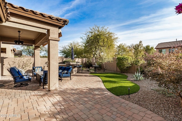 view of patio / terrace featuring an outdoor hangout area and ceiling fan