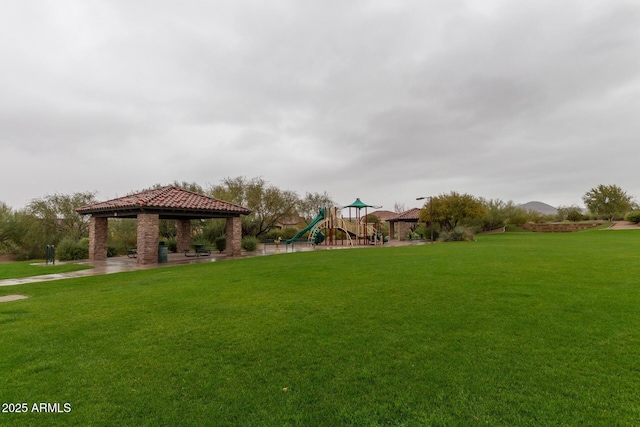 view of yard with a playground and a gazebo