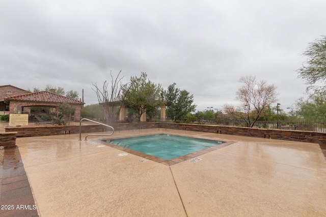 view of pool featuring a gazebo and a patio