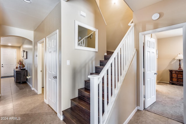 stairs with carpet floors