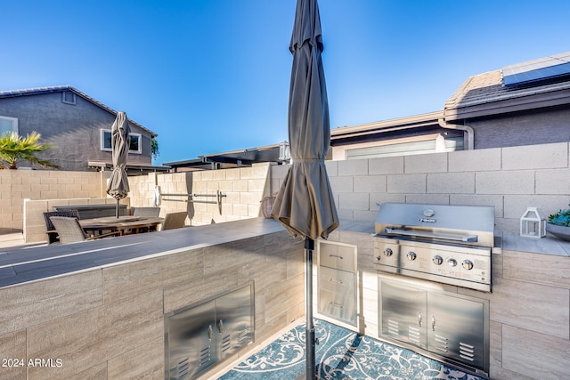 view of patio featuring a grill and area for grilling