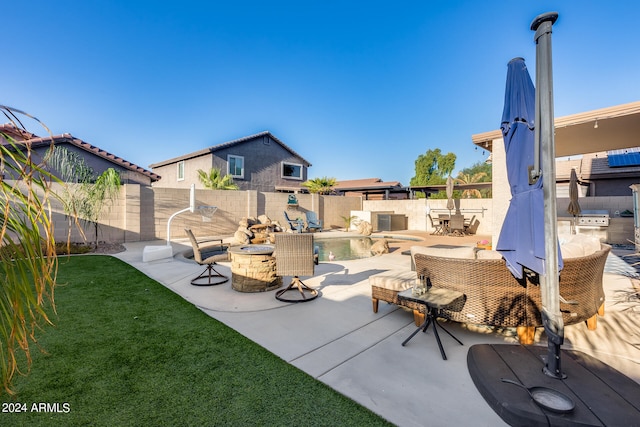 view of patio / terrace featuring a fire pit