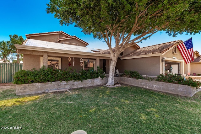 937 N Marble St, Gilbert, AZ 85234 - view of front of house featuring roof mounted solar panels and stucco siding