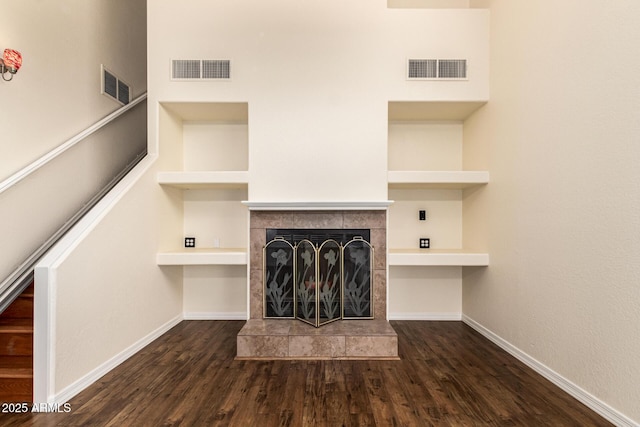937 N Marble St, Gilbert, AZ 85234 - unfurnished living room featuring wood finished floors, baseboards, and a fireplace