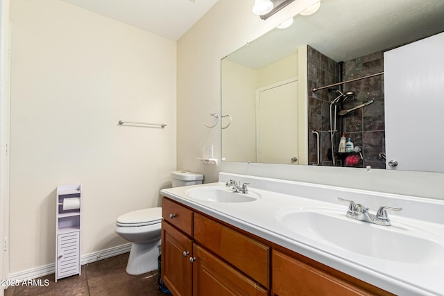 937 N Marble St, Gilbert, AZ 85234 - full bathroom featuring double vanity, a tile shower, toilet, tile patterned flooring, and baseboards