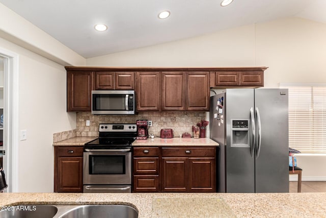 937 N Marble St, Gilbert, AZ 85234 - kitchen with appliances with stainless steel finishes, lofted ceiling, tasteful backsplash, recessed lighting, and dark brown cabinetry