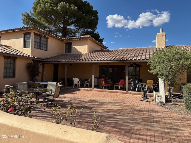 1565 E 12th St, Douglas, AZ 85607 - rear view of property with outdoor dining area, a patio area, and stucco siding