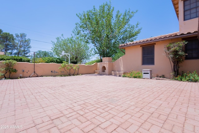 1565 E 12th St, Douglas, AZ 85607 - fenced backyard featuring a gate and a patio area