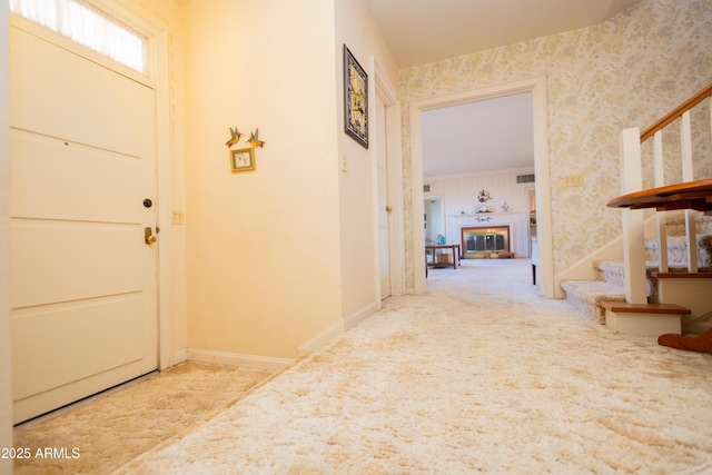 1565 E 12th St, Douglas, AZ 85607 - carpeted foyer entrance featuring stairway and wallpapered walls