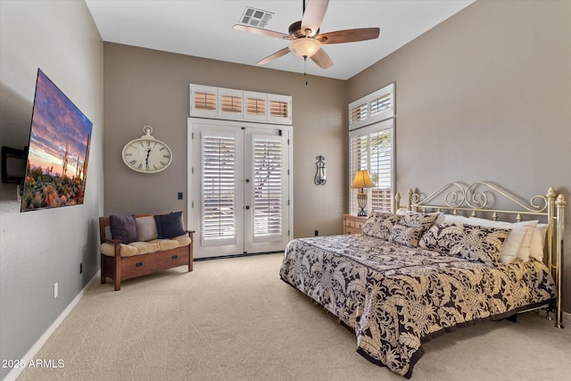 bedroom with french doors, ceiling fan, access to exterior, and light carpet