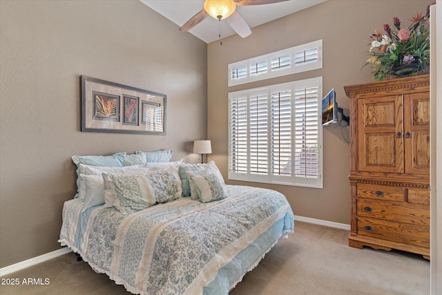 bedroom with light colored carpet and ceiling fan