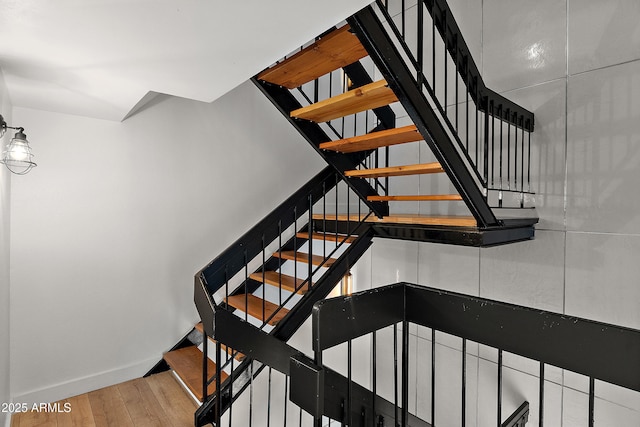 5621 N 79th St, Scottsdale, AZ 85250 - stairway featuring wood finished floors and baseboards