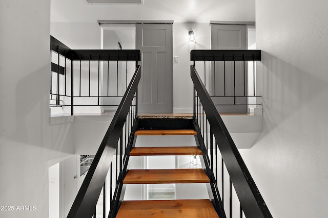 5621 N 79th St, Scottsdale, AZ 85250 - stairway featuring baseboards and wood finished floors