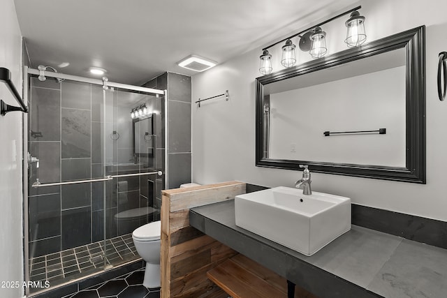 5621 N 79th St, Scottsdale, AZ 85250 - bathroom with toilet, a stall shower, tile patterned floors, and vanity