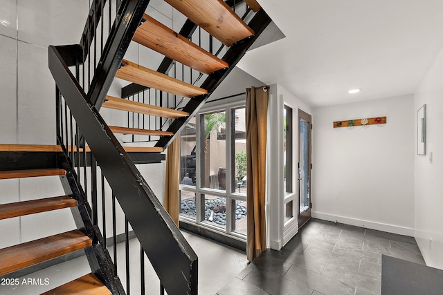 5621 N 79th St, Scottsdale, AZ 85250 - stairway featuring baseboards and recessed lighting