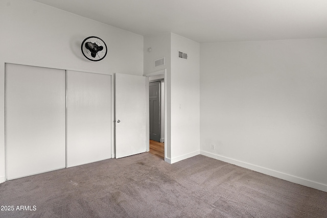 5621 N 79th St, Scottsdale, AZ 85250 - unfurnished bedroom featuring carpet flooring, a closet, and baseboards