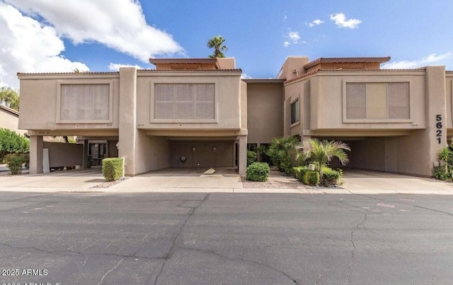 5621 N 79th St, Scottsdale, AZ 85250 - view of front of home featuring stucco siding and a carport