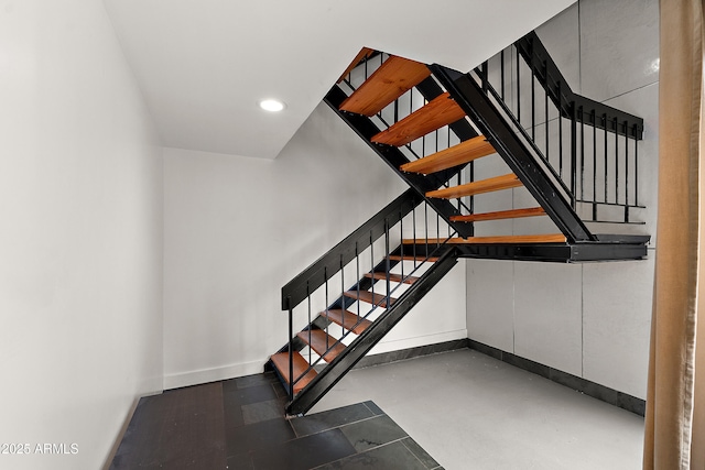 5621 N 79th St, Scottsdale, AZ 85250 - staircase with baseboards, finished concrete flooring, and recessed lighting