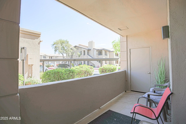 balcony featuring a residential view