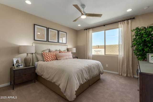 bedroom featuring light colored carpet, baseboards, ceiling fan, and recessed lighting