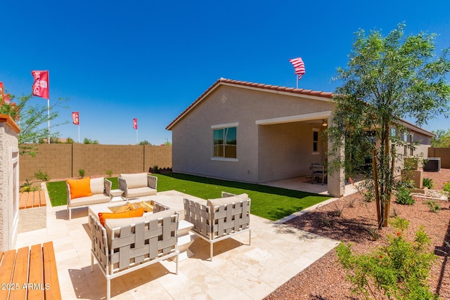 view of patio / terrace featuring cooling unit, a fenced backyard, and an outdoor living space
