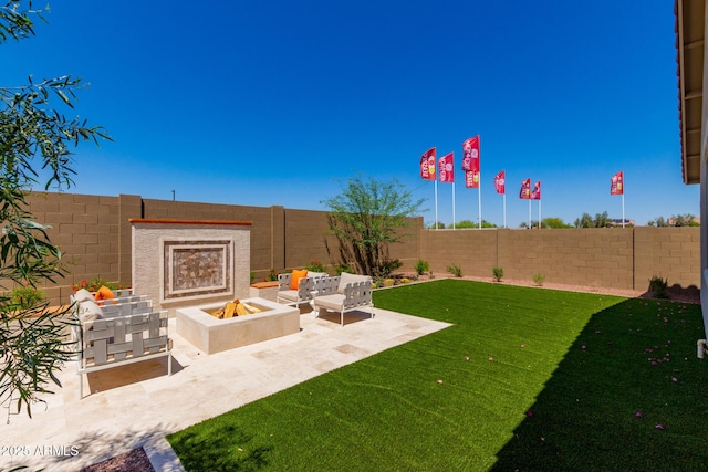 view of yard featuring a fenced backyard, an outdoor living space with a fire pit, and a patio