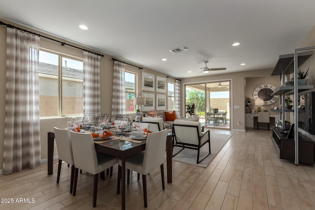 dining space with a ceiling fan, recessed lighting, baseboards, light wood finished floors, and visible vents