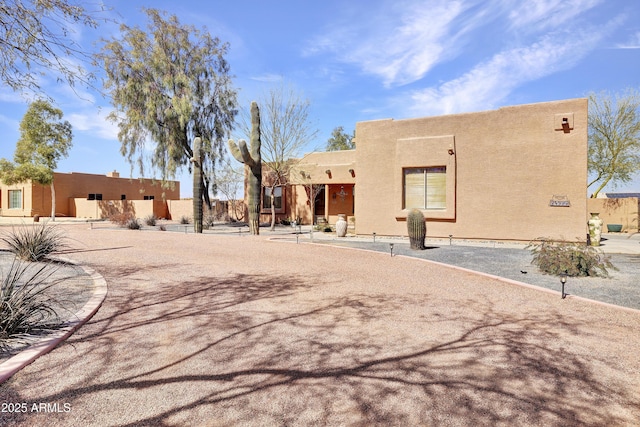 exterior space featuring stucco siding