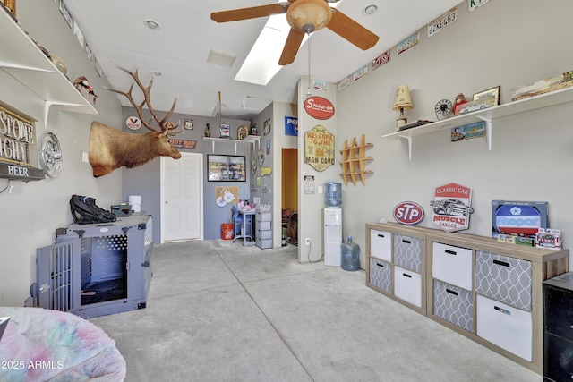 garage featuring visible vents and ceiling fan