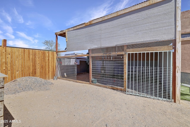 exterior space featuring an outbuilding and an exterior structure