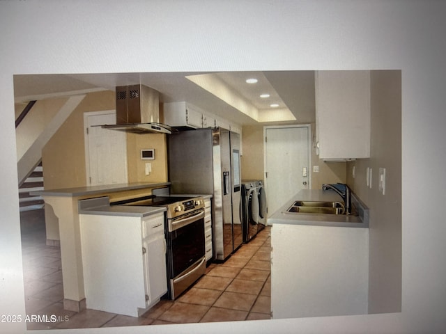 8653 S 51st St Unit 2, Phoenix, AZ 85044 - kitchen with washing machine and clothes dryer, a sink, wall chimney range hood, electric range, and recessed lighting