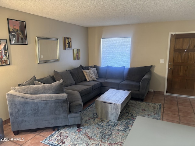 8653 S 51st St Unit 2, Phoenix, AZ 85044 - living room with tile patterned floors and a textured ceiling