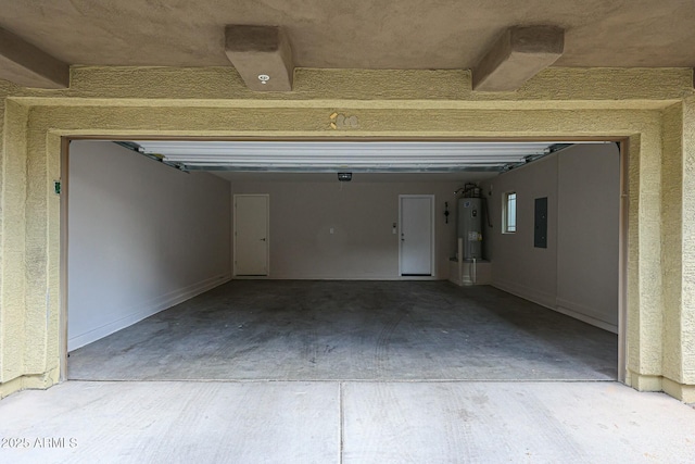 garage featuring electric panel and electric water heater