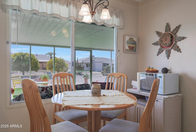 dining room with a chandelier