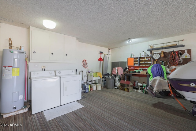 laundry room featuring water heater, cabinets, dark colored carpet, a textured ceiling, and washing machine and clothes dryer