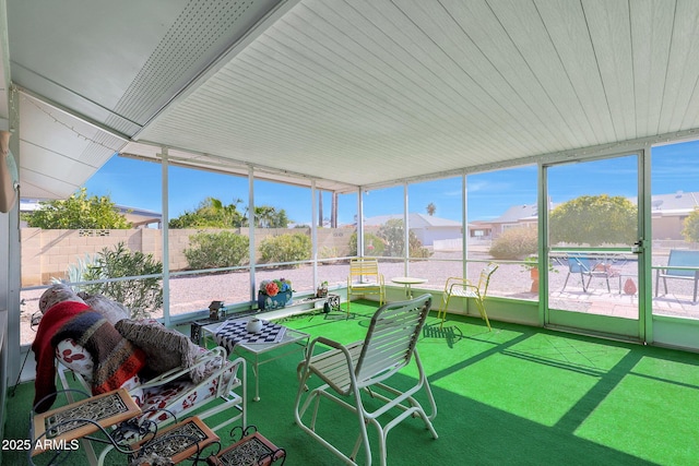 sunroom / solarium with a healthy amount of sunlight