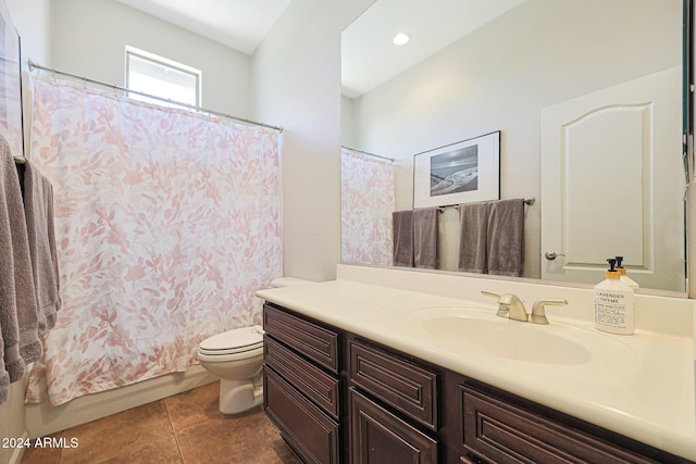 full bathroom featuring toilet, tile patterned flooring, shower / tub combo with curtain, and vanity