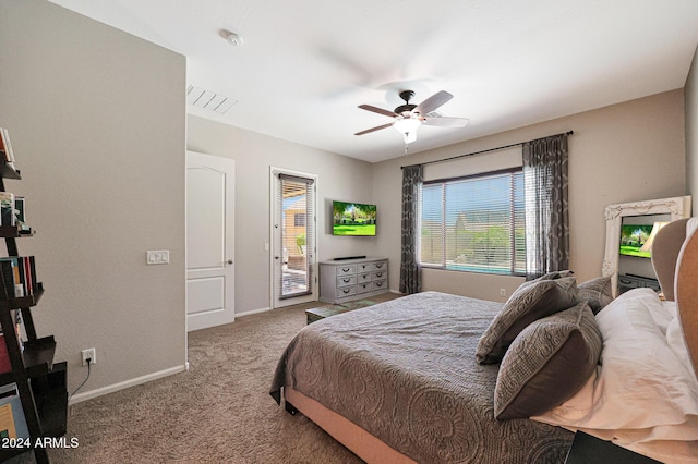 carpeted bedroom featuring ceiling fan and access to exterior