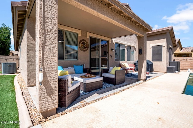 view of patio featuring central AC, an outdoor living space with a fire pit, fence, and grilling area