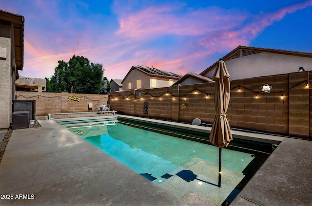 view of pool with central air condition unit, a fenced in pool, a fenced backyard, and a patio area
