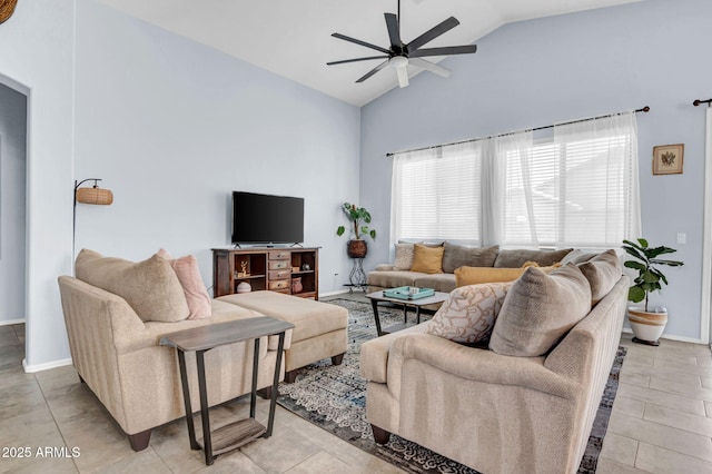 living area featuring high vaulted ceiling, baseboards, and a ceiling fan
